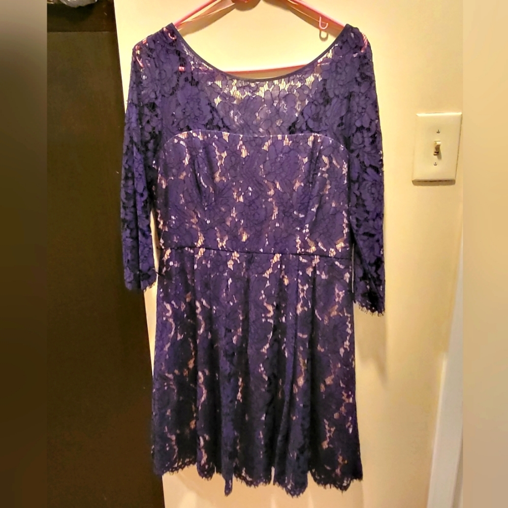 Navy lace fit and flare dress with champagne satin lining